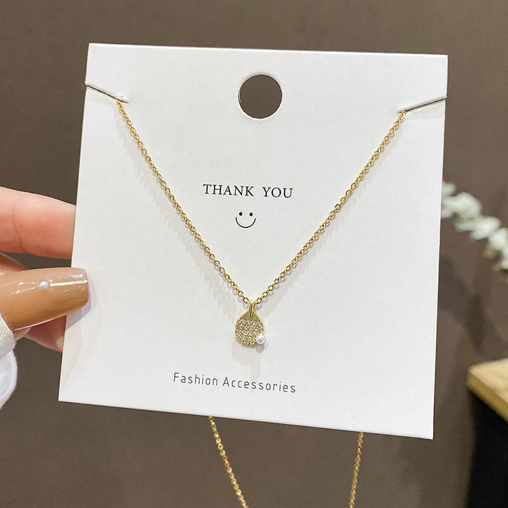 European and American retro titanium necklace female designed high-grade pearl pendant INS style wild lock bone chain jewelry gogodiggity